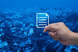 Foto: Stadt und digitales Dokument